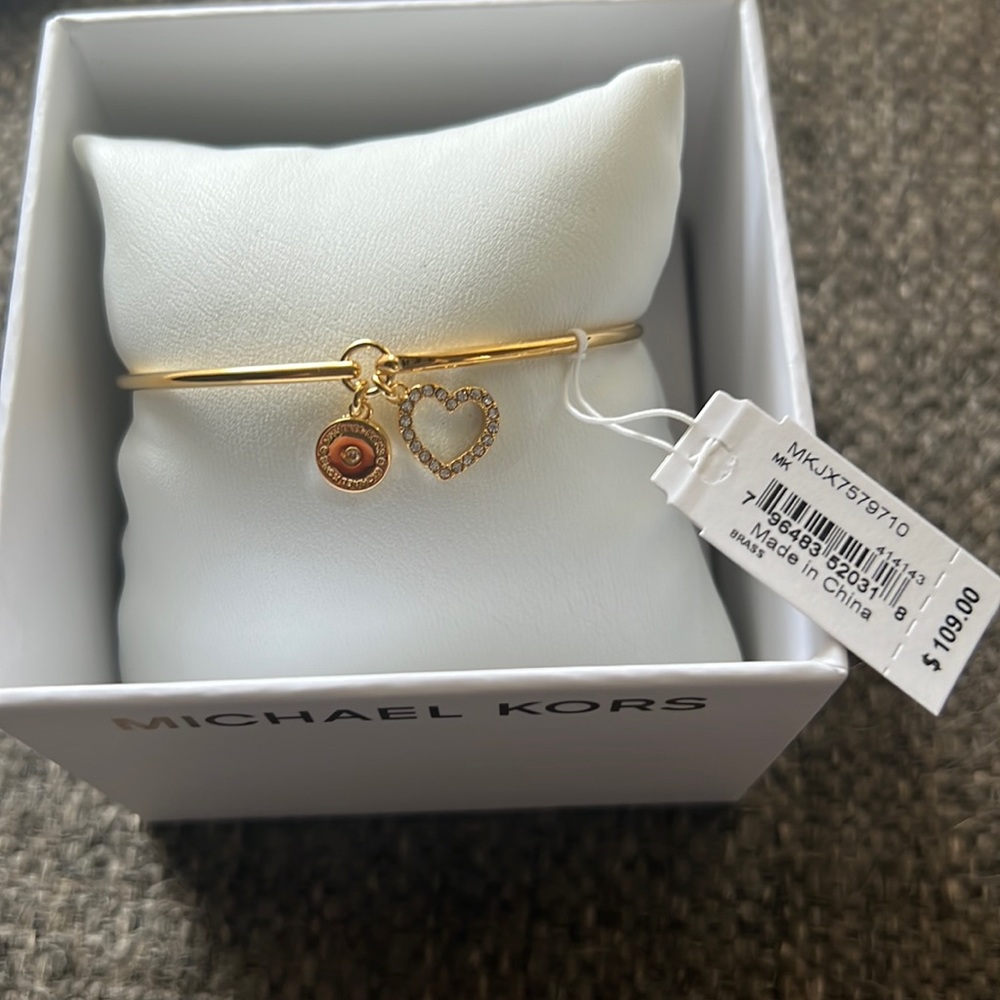 Micheal Kors gold hard wire bracelet new